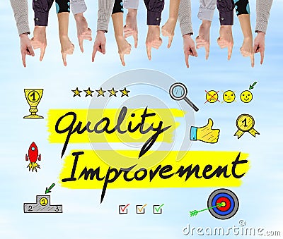 Quality improvement concept on a wall Stock Photo