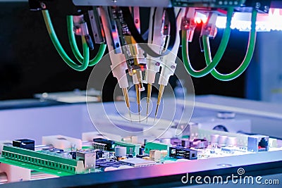 Quality testing of printed circuit boards - flying probe test at factory Stock Photo