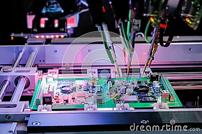 Quality testing of printed circuit boards - flying probe test at factory Stock Photo