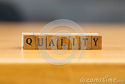 Quality. word written on wood block Stock Photo