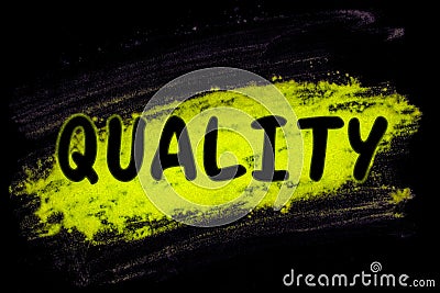 Quality word with glow powder Stock Photo