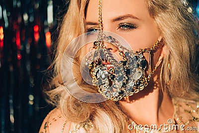 Quarantine carnival pandemic jewelry woman mask Stock Photo