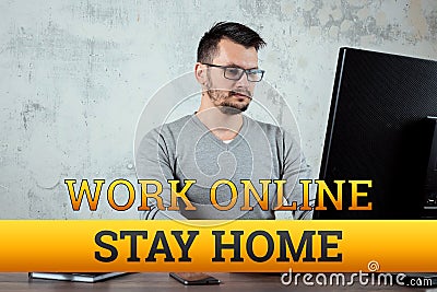 Quarantine inscription sit at home, work online, isolation. Coronavirus. A man works from home. Freelan concept, distant work Stock Photo