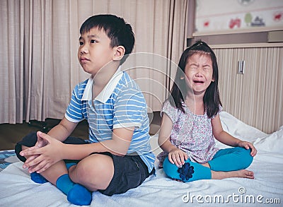 Quarreling conflict of children. Relationship difficulties in fa Stock Photo