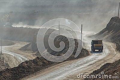 Quarry dumptruck working in a coal mine Stock Photo