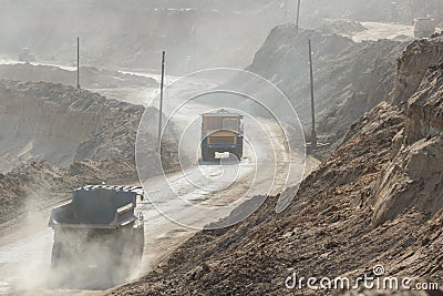 Quarry dumptruck working in a coal mine Stock Photo