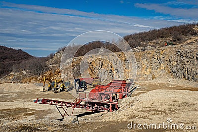 Quarry excavating machines and crusher Stock Photo