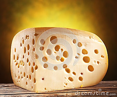 Quarter of Emmental cheese head. Stock Photo