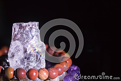 Quartz geode with semiprecious gemstone bracelets charging, spirituality concept, alternative medicine Stock Photo