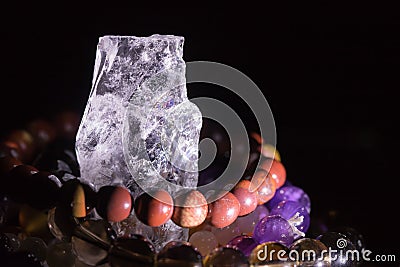 Quartz geode with semiprecious gemstone bracelets charging, spirituality concept, alternative medicine Stock Photo