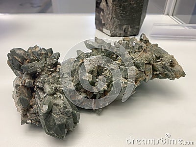 Quartz with intergrown chlorite or Quarz mit eingewachsenem Chlorit minerals and crystals in the exhibition Mount SÃ¤ntis Stock Photo