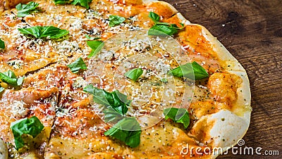 Quattro Formaggio Four Cheese Pizza. Italian pizza on wooden table Stock Photo