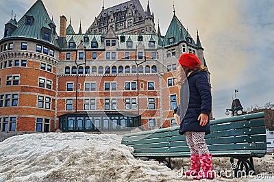 Quebec, Canada, April 16, 2019: Quebec city travel little girl walking on Promenade Terrasse Dufferin visiting old town Editorial Stock Photo