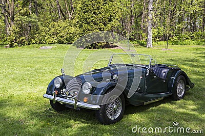 Classic 60s Morgan sports car painted in British Racing Green shown during the Rendez-vous British event Editorial Stock Photo