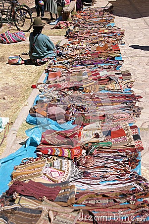 Quechua Indian woman selling blankets Stock Photo