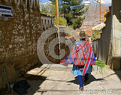 Quechua woman, traditional costume. Cusco, Peru Editorial Stock Photo