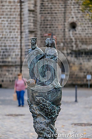 Quedlinburg, Germany, 28 October 2022: Monument near St. Benedict church, Personalities from history, fountain, dog Quedel Editorial Stock Photo