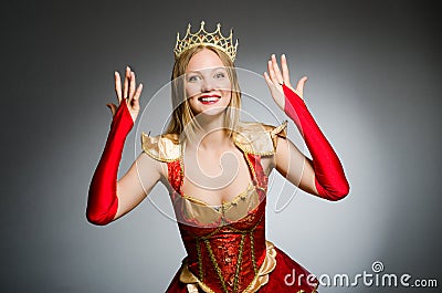 Queen in red costume Stock Photo