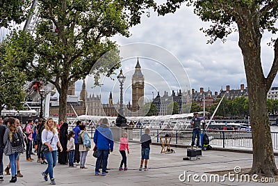 The Queen's Walk promenade on the southern bank of the River Thames in London, Uk. Editorial Stock Photo