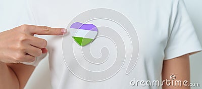 Queer Pride Day and LGBT pride month concept. purple, white and green heart shape for Lesbian, Gay, Bisexual, Transgender, Stock Photo