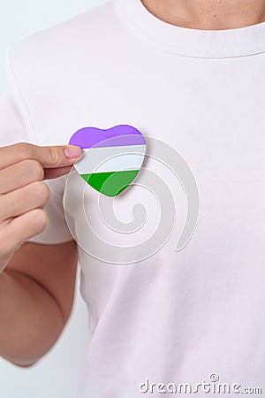 Queer Pride Day and LGBT pride month concept. purple, white and green heart shape for Lesbian, Gay, Bisexual, Transgender, Stock Photo