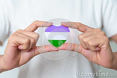 Queer Pride Day and LGBT pride month concept. purple, white and green heart shape for Lesbian, Gay, Bisexual, Transgender, Stock Photo