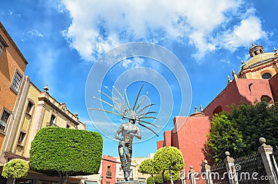 QUERETARO, MEXICO, 10 MARCH 2016: Metal statue of dancing Indian man in Queretaro's downtown. Editorial Stock Photo