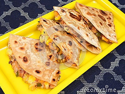 Quesadilla is a tortilla filled with cheese and veggies Stock Photo