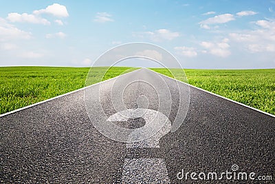 Question mark symbol on long empty straight road, highway Stock Photo