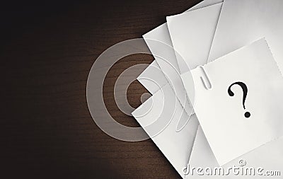 Question mark on white notepad Stock Photo