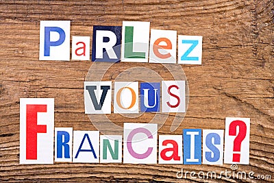Question `Parlez-vous Francais?` on wooden background Stock Photo