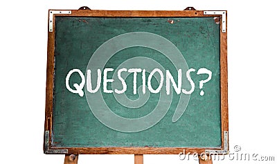 Questions? text word message in white chalk written on a green old grungy vintage wooden chalkboard or blackboard with frame Stock Photo