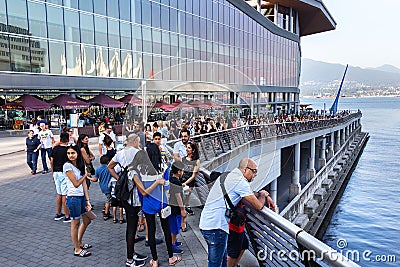 Queue line up for the Aritzia Warehouse Sale, Vancouver Canada. Editorial Stock Photo