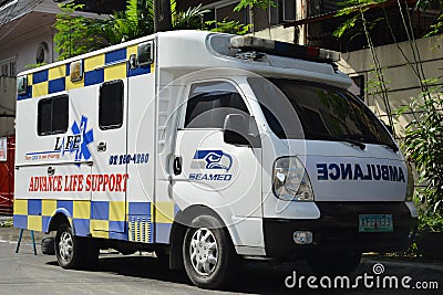 Seamed ambulance van in Quezon City, Philippines Editorial Stock Photo