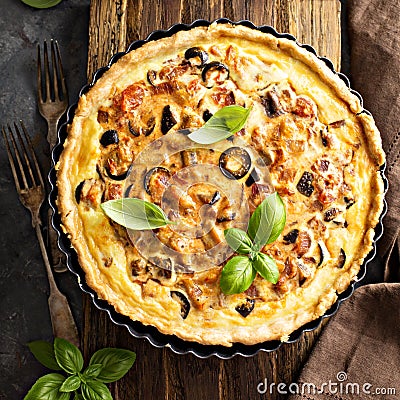 Quiche with eggplant, chicken and olives Stock Photo