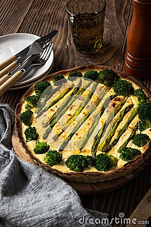 Quiche Tart with vegetable. Serwing on wooden table Stock Photo