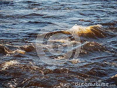 Quick water flow in a river, Nature background. Selective focus Stock Photo