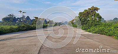 A quiet asphalt road on the edge of town Stock Photo