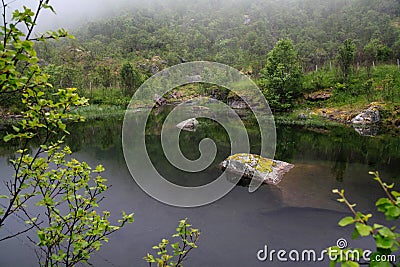Quiet calm panorama of a fabulous view by lake. Tranquil Scene. A relaxing evening on shore of transparent clean water lake in Stock Photo