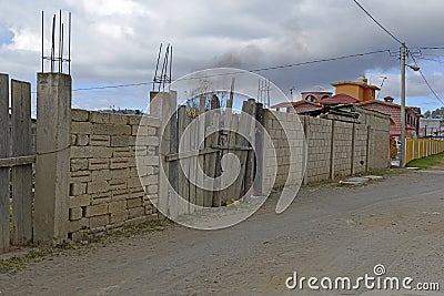 Quiet dirt road in rural farming village, Mexico Stock Photo