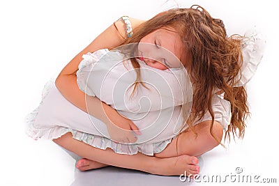 Quiet little girl with a pillow Stock Photo