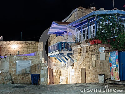 Quiet streets of the old town of Yafo at night. Lane sign of the zodiac Libra in old city Yafo, Israel. Editorial Stock Photo