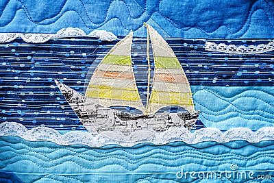 Colorfull coastal and nautical baby quilt with Sail boat details Stock Photo