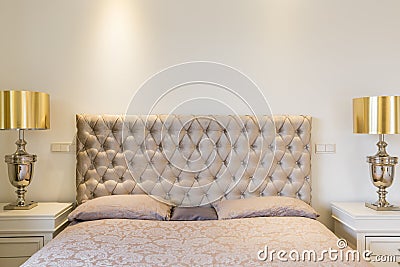 Quilted headboard bed Stock Photo