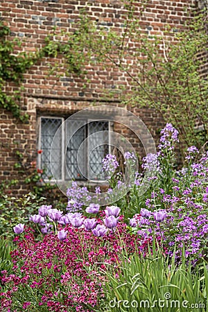 Quintessential vibrant English country garden scene landscape wi Stock Photo