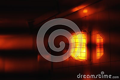 Bright red street vandal-proof lamp Stock Photo