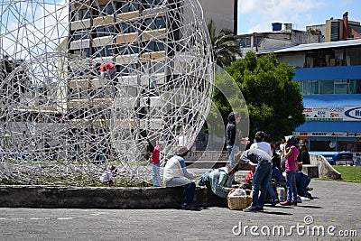 QUITO, ECUADOR - JANUARY 28, 2016: Close up of an unidentified people waiting near of monument in arbolito park, march Editorial Stock Photo
