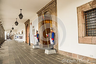 QUITO, ECUADOR, JANUARY, 11- 2018: Unidentied body guards at the enter of passage at presidential Carondelet palace Editorial Stock Photo