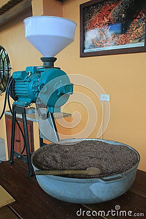 Quito, Ecuador 24-11-2019: machine to grind roasted cacao beans to make chocolate Editorial Stock Photo