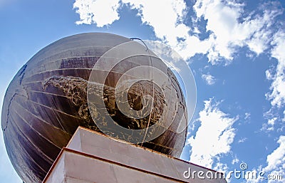 QUITO, ECUADOR - NOVEMBER 12, 2017: Below view of globe monument at the middle of the World, touristic attraction, north Editorial Stock Photo